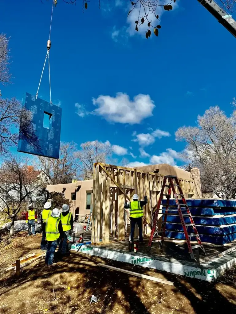 Historic Santa Fe Casita under construction with exterior framing near Boulder.